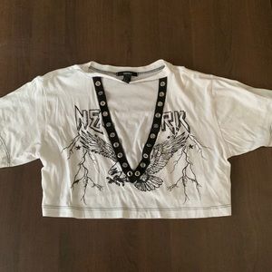 cropped white shirt, it’s open from the front so will need a undershirt/bandeau